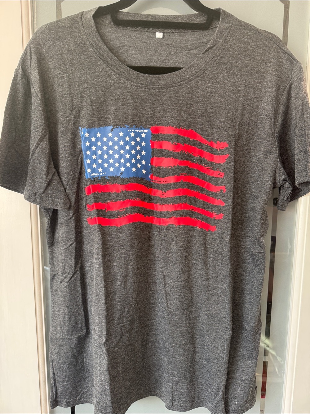 Gray T-Shirt with Distressed American Flag Graphic